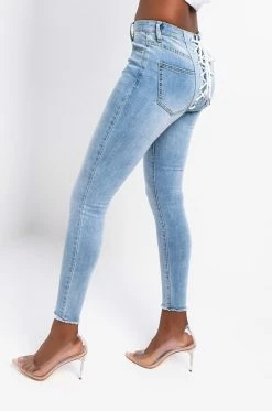 ALL OVER LACE UP BACK SKINNY JEANS