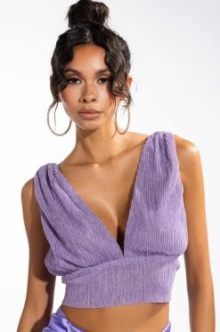 POISED SLEEVELESS V NECK PEPLUM BLOUSE